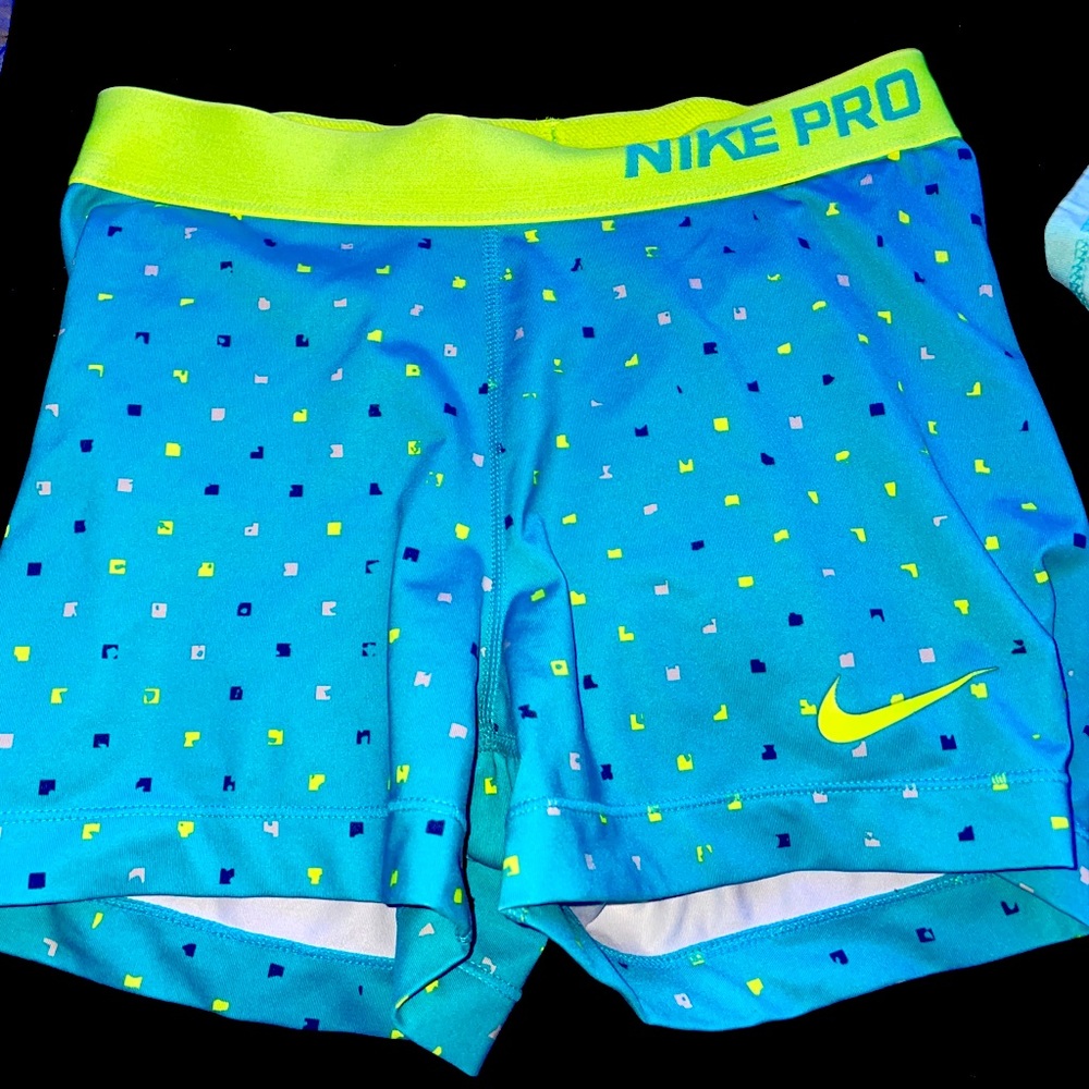 blue and green nike pro shorts